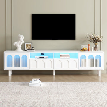 Cream Style TV Stand with LED Light Strip for TVs Up to 80'', Graceful Entertainment Center with 5 Solid Wood Legs, Large Storage Media Console with Fluted Tempered Glass Doors, White/Black